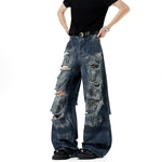 Dirty Stained And Ripped Jeans