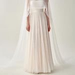 Elegant White Pleated Gown With Sheer Cape Overlay