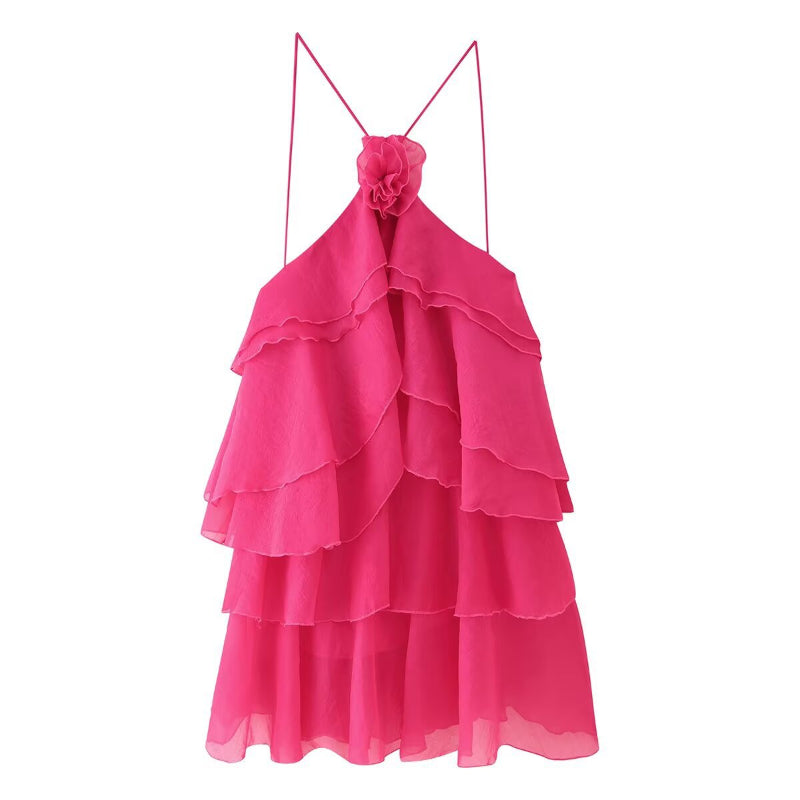 A sleeveless, strapless short dress with layered ruffles, a V-neck, and a mid-waist fit.