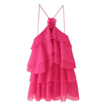 A sleeveless, strapless short dress with layered ruffles, a V-neck, and a mid-waist fit.