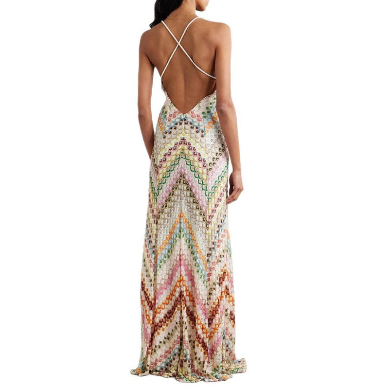 A sleeveless multicolor floral bodycon midi dress with pullover closure from Runwayfashionista.