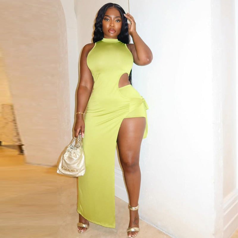 A sleeveless, high-neck midi dress with an irregular hem and side slit, shown in a vibrant yellow-green color.