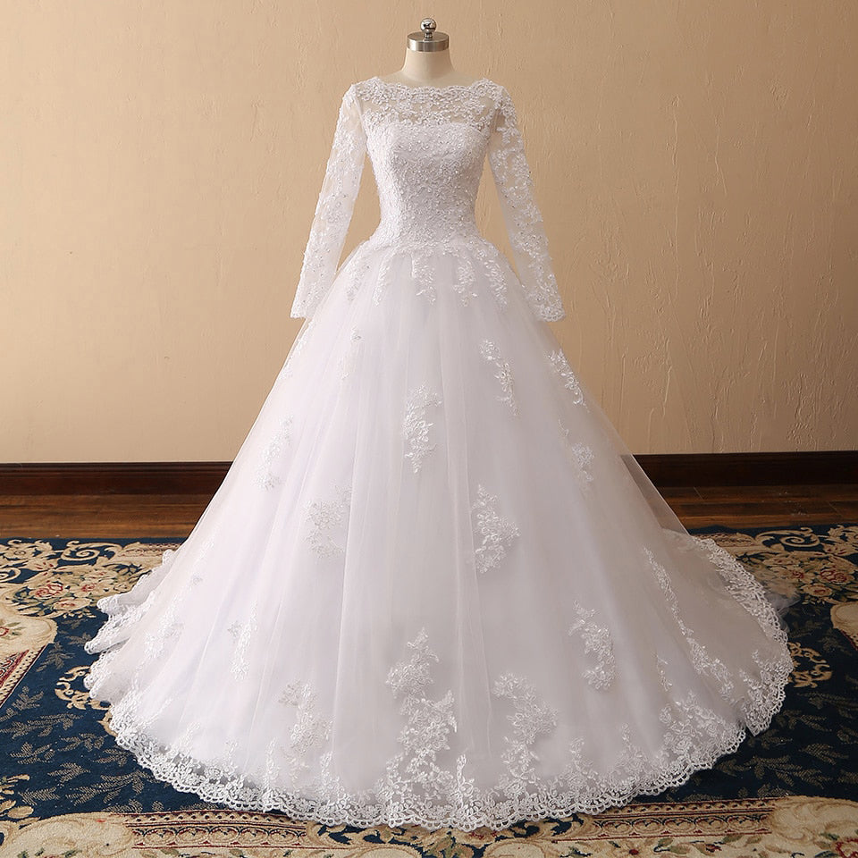 Long Sleeves Wedding Gown - runwayfashionista.com