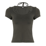 Make a bold statement in this sleek, short-sleeved square neck crop top. Perfect for a confident and stylish look, available in black and military green.