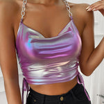 A person wearing a purple sleeveless halter top with a slim fit and backless design, suitable for street style.