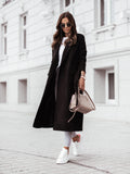 Long sleeved V-neck tied woolen jacket