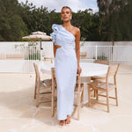 A fitted, one-shoulder maxi dress with a V-neck and sleeveless design, available in green, yellow, rose pink, red, and black, suitable for resort wear.