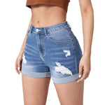 A pair of light blue, high-waisted denim shorts with distressed holes and a cuffed hem. The shorts have a skinny fit and are displayed on a flat surface.