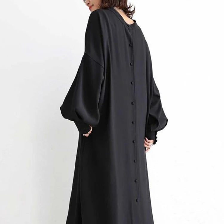 Black or apricot lantern sleeve single-breasted long dress made of chiffon with a solid color, round neck, puff long sleeves, and loose waist, available in one size.