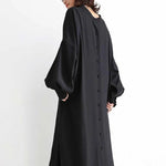 Black or apricot lantern sleeve single-breasted long dress made of chiffon with a solid color, round neck, puff long sleeves, and loose waist, available in one size.