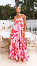 A collection of large swing suspender midi dresses in various prints and colors, including purple stripes, brown stripes, red floral, and different floral patterns.