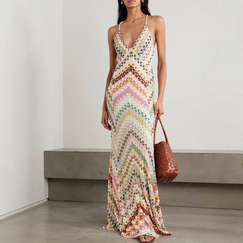A sleeveless multicolor floral bodycon midi dress with pullover closure from Runwayfashionista.