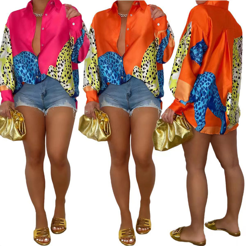 A loose-fit, long-sleeve shirt with a striking animal print pattern.