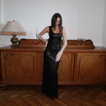 Black or wine red PU leather split long dress with a U-shaped collar, sleeveless design, high waist, backless feature, and one-step skirt, available in sizes S, M, L.
