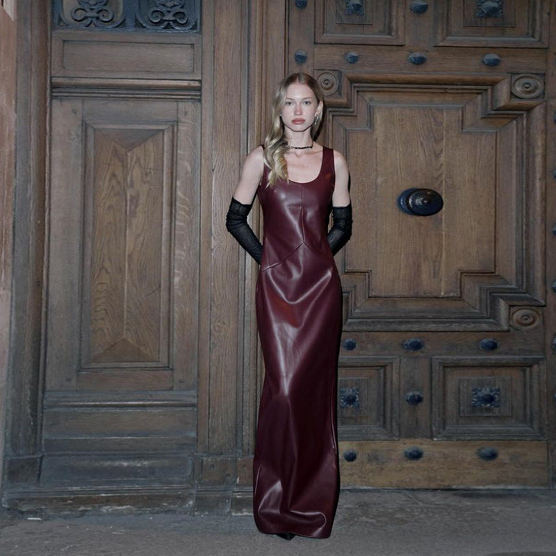 Black or wine red PU leather split long dress with a U-shaped collar, sleeveless design, high waist, backless feature, and one-step skirt, available in sizes S, M, L.