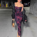 Text: A strapless, bodycon midi dress with a floral print, shown in a purple color.

