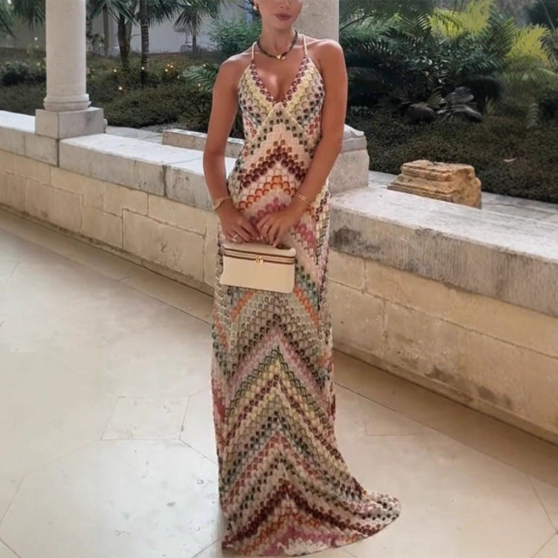 A sleeveless multicolor floral bodycon midi dress with pullover closure from Runwayfashionista.