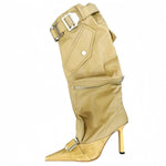 Step out boldly with these pointed toe, knee-length boots featuring a long tube design and a striking belt buckle detail.