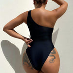 Make a bold statement with this daring mesh one-piece swimsuit, perfect for turning heads and feeling confident.