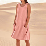 A sleeveless, mid-length A-line tank dress with a round neck.