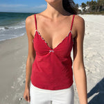 Step up your look with this elegant, slim-fit tank top.