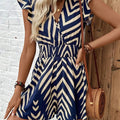 Printed Surplice Cap Sleeve Romper - runwayfashion.com