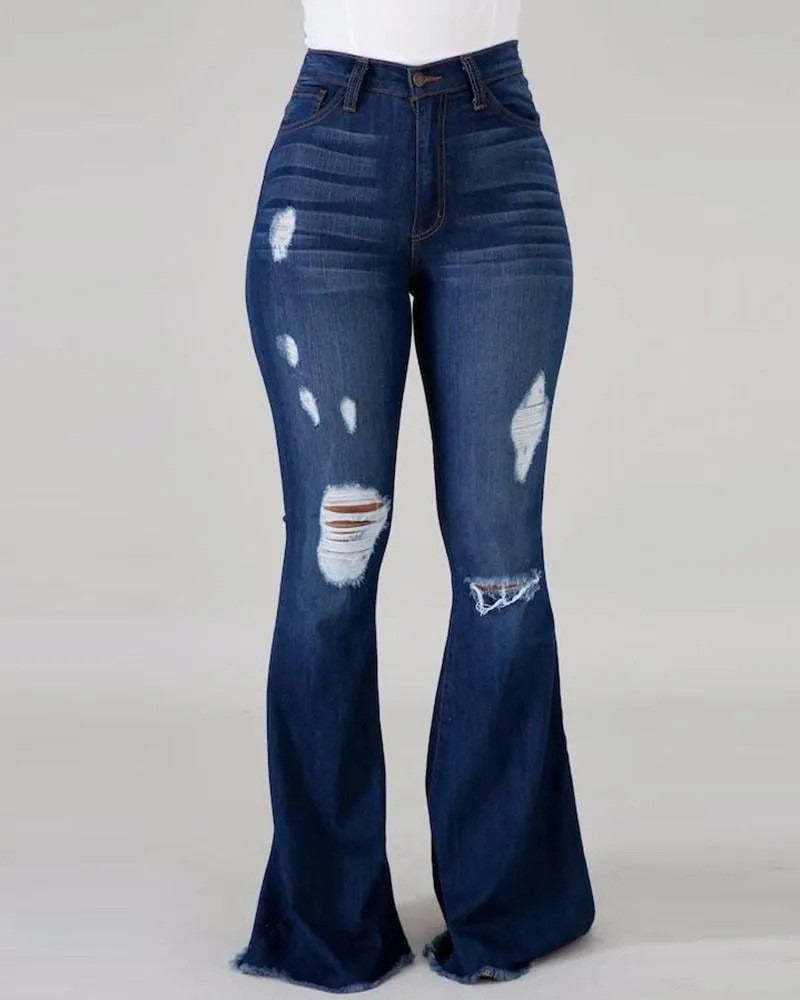 High Waist Ripped Flared Jeans - runwayfashionista.com