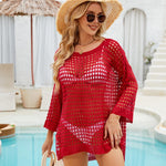 This daring three-quarter sleeve cover-up features bold hollow-out details for a striking look that layers effortlessly over your outfit.