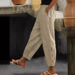 Button-Adorned Bottom Hem Pants - cream