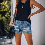 Broken hole tassel denim shorts