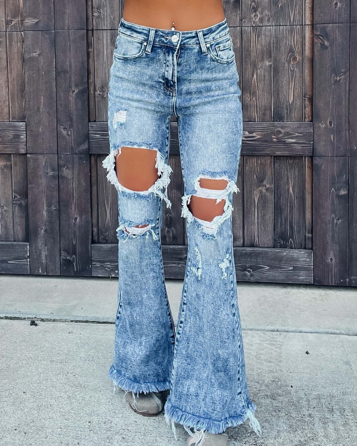 Distressed water washed micro flared jeans - runwayfashionista.com