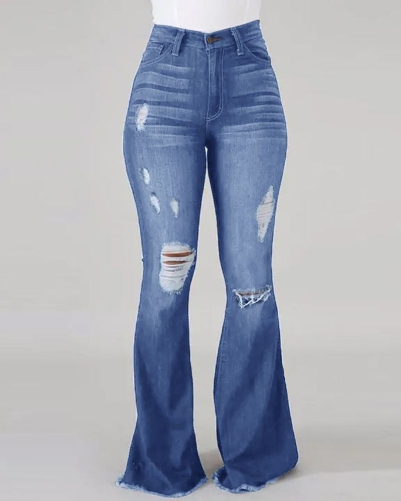 High Waist Ripped Flared Jeans - runwayfashionista.com