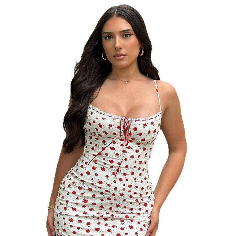 A pink floral print one-shoulder dress with a lace hem, displayed on a mannequin to showcase its long, fitted shape and sweet style.