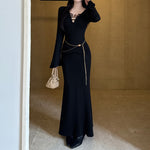 The Black V-Neck Midi: Beading, Boldness & Glamour