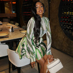 Stylish European and American style skirt set for casual occasions, featuring a short floral dress with long sleeves, available in green floral and red floral.