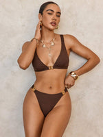 Turn heads with this daring metallic bikini designed to highlight your bold style effortlessly.