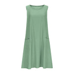 A sleeveless, mid-length A-line tank dress with a round neck.