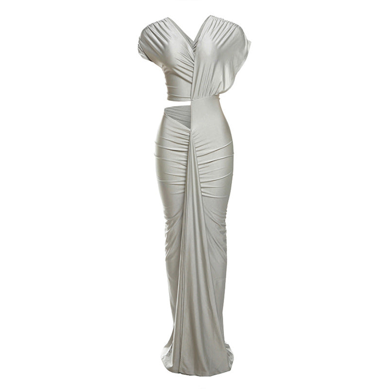 High-waisted silver long dress with irregular hollow pattern and short sleeves.