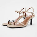 Step out boldly with these square-toe, low-heeled sandals that blend style and comfort effortlessly.