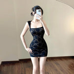 Sleek Sophistication: The Black One-Shoulder Mini