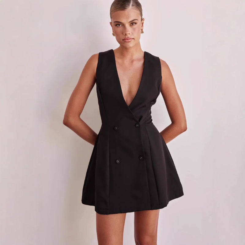 A model wearing a solid color sleeveless short V-neck dress.