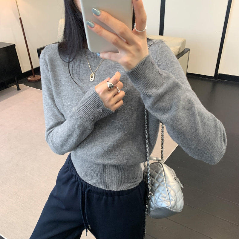 Gemini saidElegance in Every Thread: The Soft Round Neck Knit Top - grey