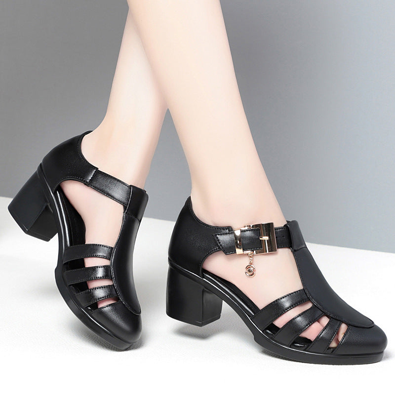 A pair of new style hollow sandals with a round toe and low heel, featuring a buckle closure and two-layer cowhide material.