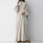 Black or apricot lantern sleeve single-breasted long dress made of chiffon with a solid color, round neck, puff long sleeves, and loose waist, available in one size.