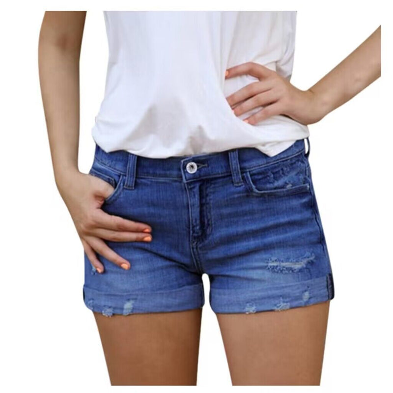 Edgy Summer Style: Ripped Denim Shorts for a Daring Look