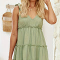 Full size frill v-neck tie shoulder mini dress in a solid color with ruffled details and an opaque finish -runwayfashionistacom