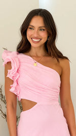 A fitted, one-shoulder maxi dress with a V-neck and sleeveless design, available in green, yellow, rose pink, red, and black, suitable for resort wear.