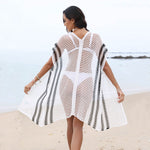 This crochet hollow bikini cover-up adds a bold, edgy touch to your beach look while letting your swimsuit peek through effortlessly.