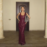 Black or wine red PU leather split long dress with a U-shaped collar, sleeveless design, high waist, backless feature, and one-step skirt, available in sizes S, M, L.