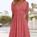 Gemini saidEffortless Chic: The V-Neck Short Sleeve Pocket Midi Dress - pink